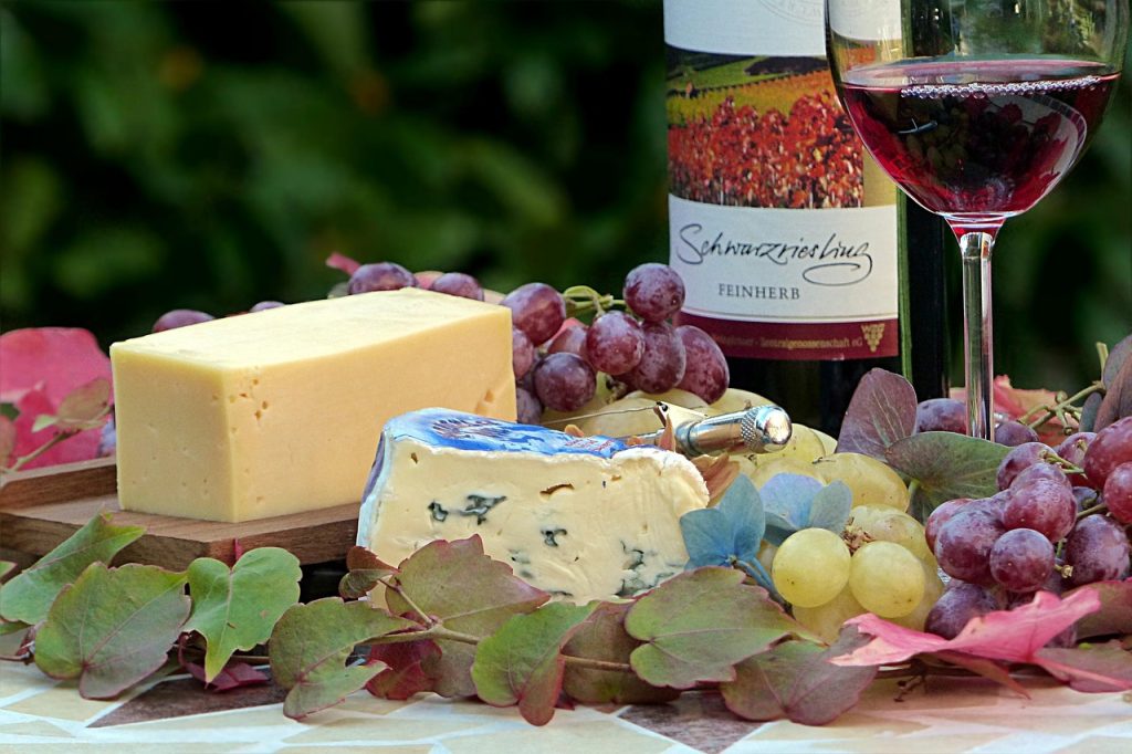 still life, meal, drink, invitation, celebration, set table, red wine, wine bottle, nature, wine glass, grapes, cheese, feasting, grape leaves, autumnal, garden