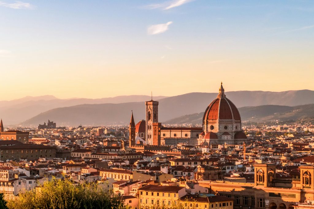 Captivating sunset over Florence, showcasing the iconic Duomo and Tuscan skyline.