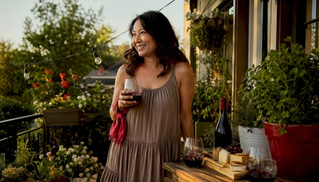 Easy Ways to Pair Natural Wines with Your Favorite Dishes Woman outdoors holding Govino stemless wine glass